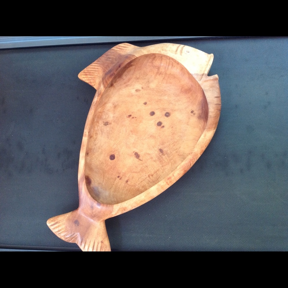 Wooden scooped out fish serving piece. Perfect for serving snacks or as decor.